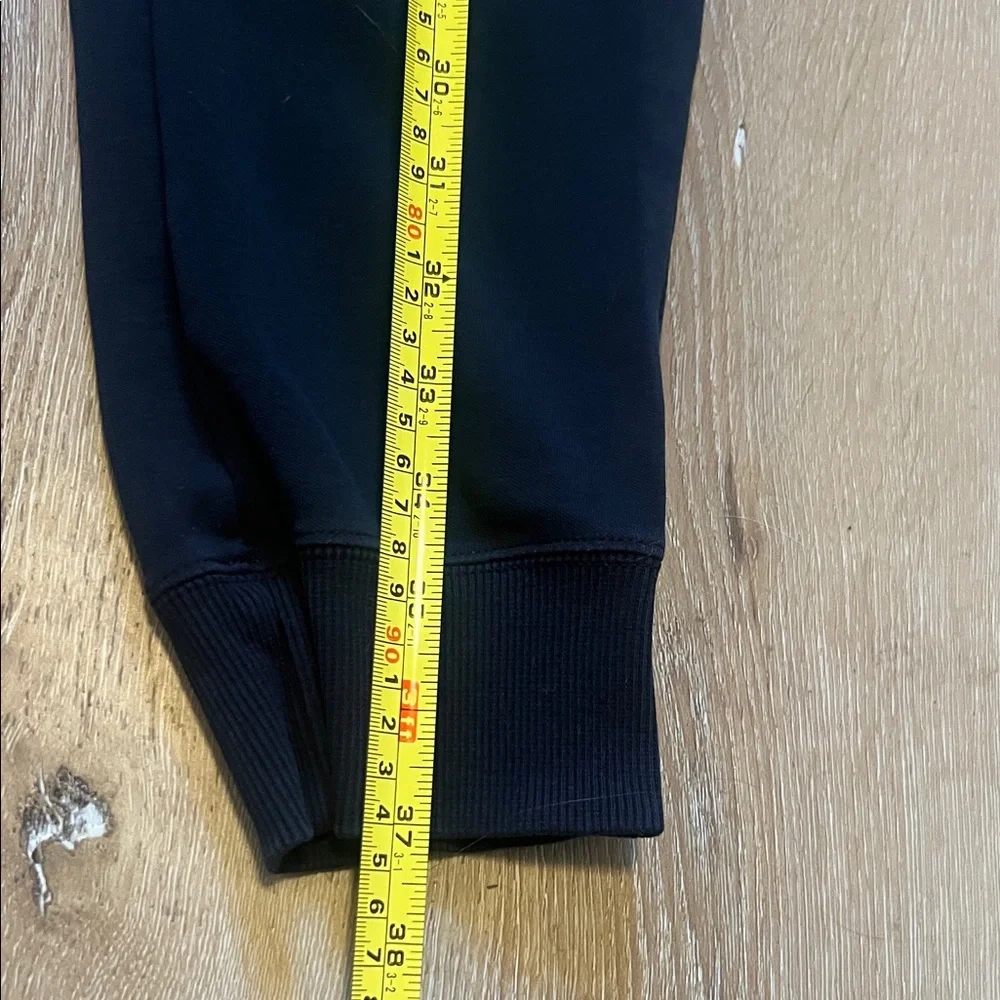 Nike Women’s front Zipper on high waist Black Joggers with White Mesh Large